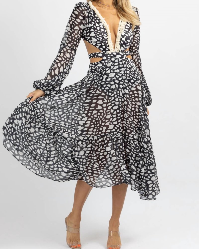 Front of a model wearing a size L Spotted Fringe Maxi Dress In Black/Ivory in Black/Ivory by LUXXEL. | dia_product_style_image_id:354643